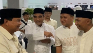 Rahmat Mirzani Djausal dan Ahmad Giri Akbar