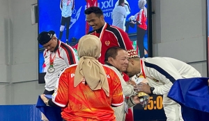 Lifter Lampung Roy Samsul Bahri meraih medali perunggu PON XXI 2024