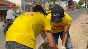 Gerakan Kuning Bersih Maxim di Bandar Lampung